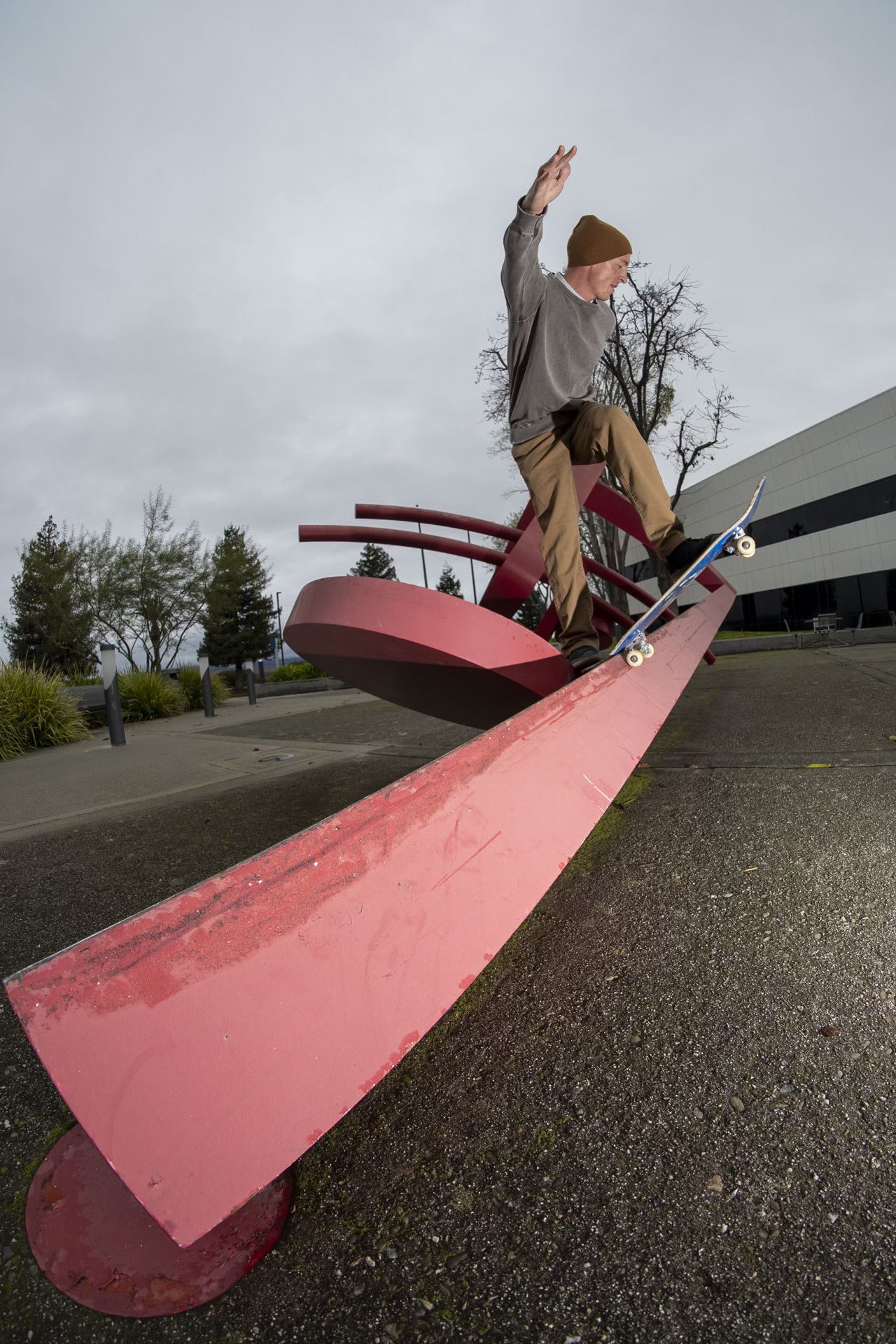 Andy Aced skating a pink ramp.